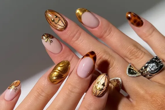 Тыквенный маникюр: идеи уютного дизайна ногтей, которые стоит повторить осенью-2025