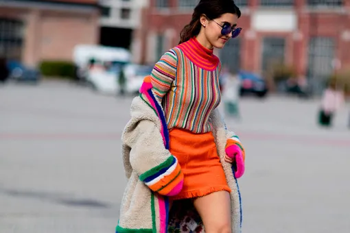 Полоски, мех и яркие пальто: чем запомнился стритстайл Миланской недели моды