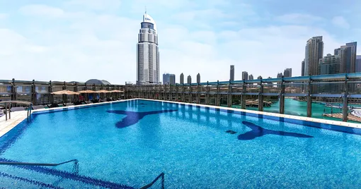 Фитнес-клуб The Burj Club с бассейном и зоной отдыха Rooftop Pool and Lounge Фитнес-клуб The Burj Club с бассейном и зоной отдыха Rooftop Pool and Lounge