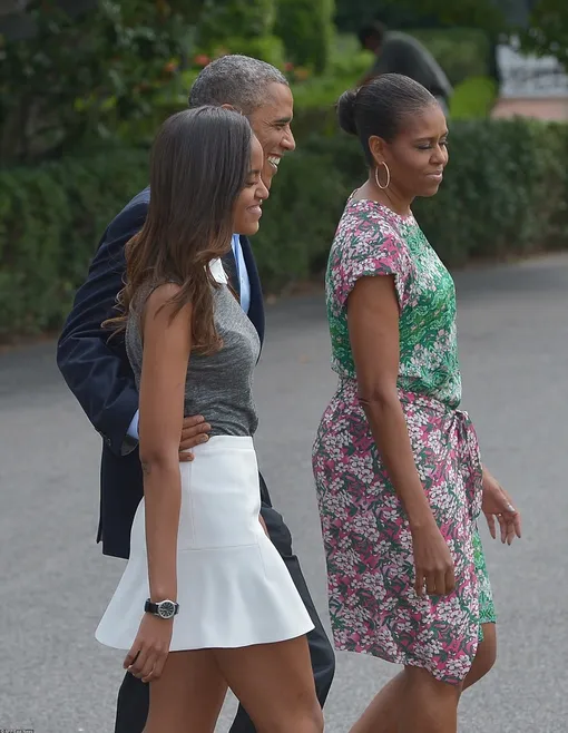 Барак и Мишель Обама с дочерью Малией